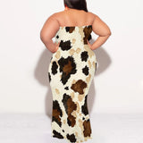 Back view of plus size strapless cow print maxi dress in brown and beige for women, perfect summer outfit.
